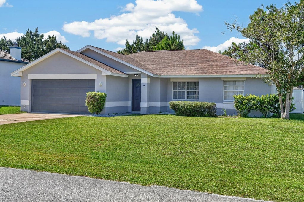 Photo of 7 Brownstone Lane, Palm Coast, FL 32137 (MLS # O6443195)