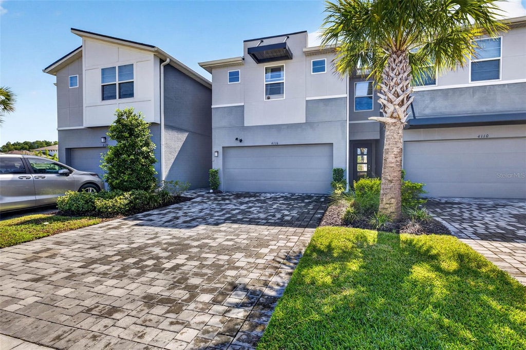 Photo of 4116 Cloud Hopper Way, Lutz, FL 33559 (MLS # TB8538420)