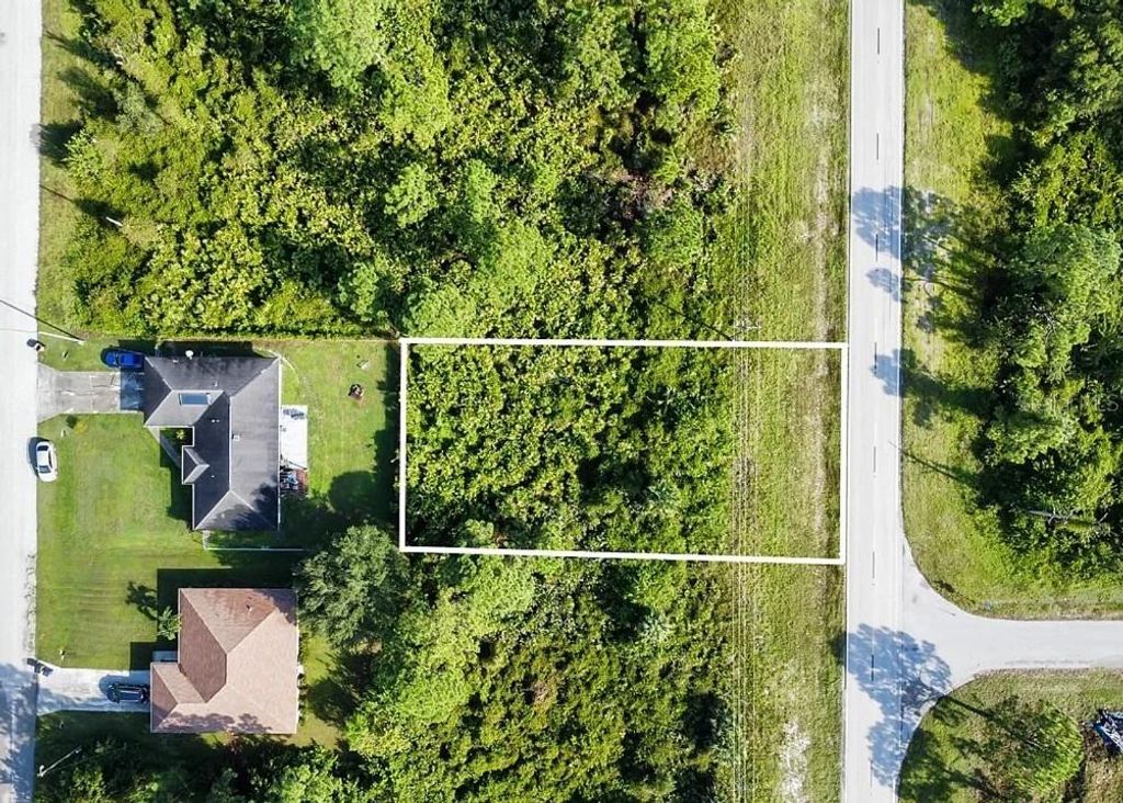 Photo of 730 Columbus Boulevard S, Lehigh Acres, FL 33974 (MLS # C7526532)