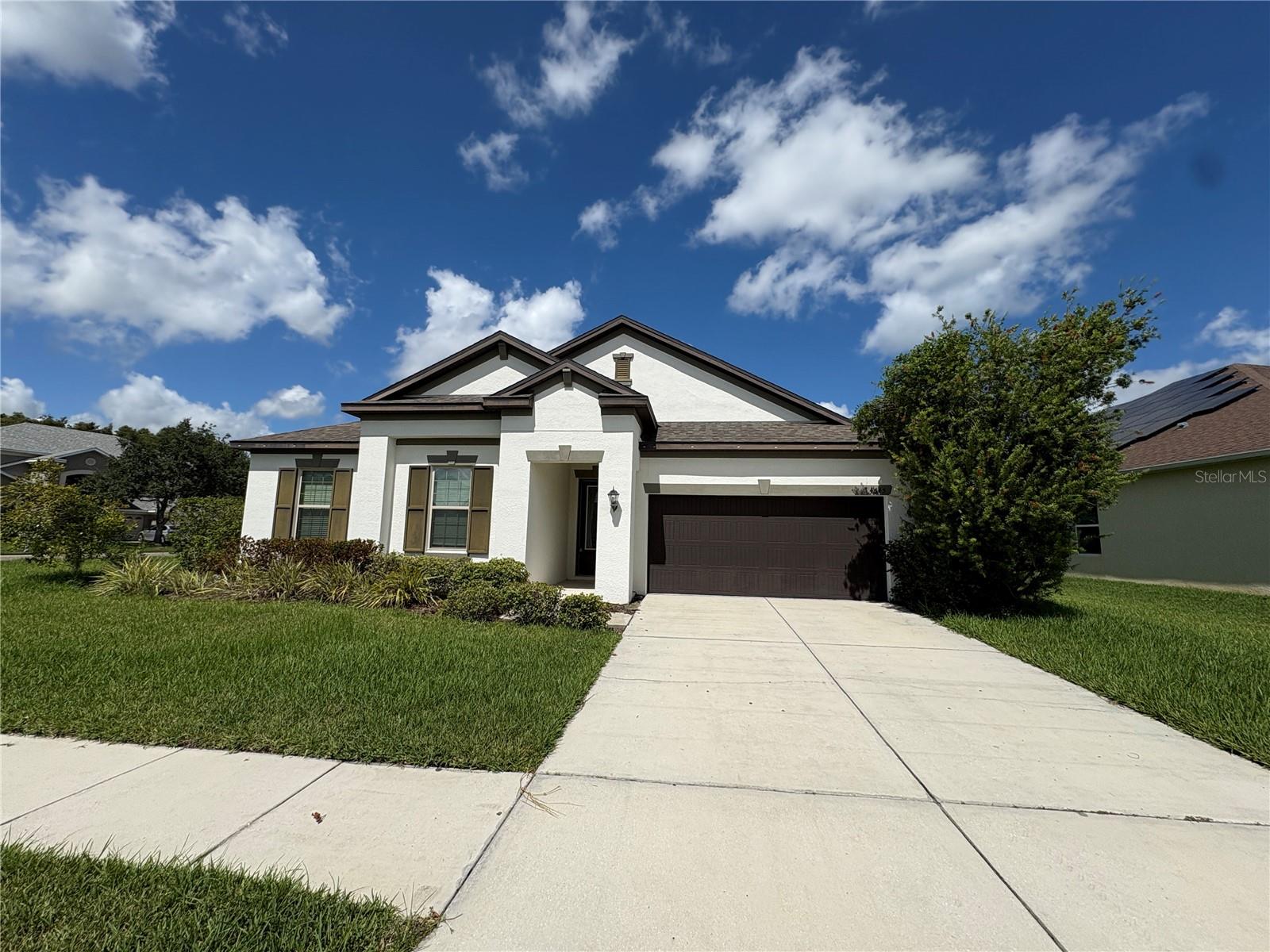 Beautiful and spacious 3 bedroom, 3 bathroom home with an office/den located in the desirable Country Walk neighborhood. This single-story home offers over 2,500 sq ft of living space and features an open floor plan with stainless steel appliances, a large walk-in pantry, mud room, and a spa-style master bath with double vanity and two oversized walk-in closets. Enjoy a large screened-in patio, fully fenced backyard, and corner lot for added privacy. Additional highlights include a washer and dryer, attached garage, and a whole-house water softener system maintained by the owner. The home is located in a resort-style community offering two pools, a clubhouse, basketball and tennis courts, playground, and a soccer field—perfect for active living.