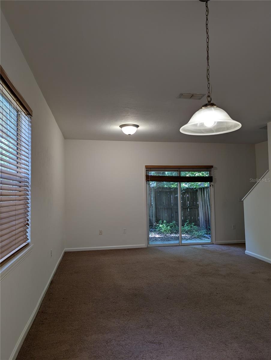 At 1300 sq. feet, this 2 story end unit townhouse offers as much living space as many single family homes. The tiled entryway includes a storage closet as well as another closet for the washer/dryer. Downstairs is a large living/dining area with sliding glass doors to a small private backyard area and storage closet. A half bath is also located downstairs offering convenience for you and your guests. The kitchen has a large pass-through counter/bar which provides more options for seating and combined with the large window on the opposite wall, makes the kitchen lighter and brighter. Two bedrooms upstairs each have their own bathroom. The master bedroom has sliding glass doors that open to a small balcony and the corner "nook" under a large window is a great space for a desk or reading area. The front bedroom has two large windows that provide lots of natural light, plenty of closet space and a second full bathroom.