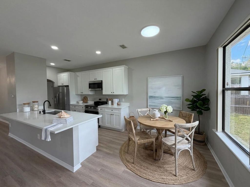 Photo of 227 N Julia Avenue, Deland, FL 32720 (MLS # O6398615)