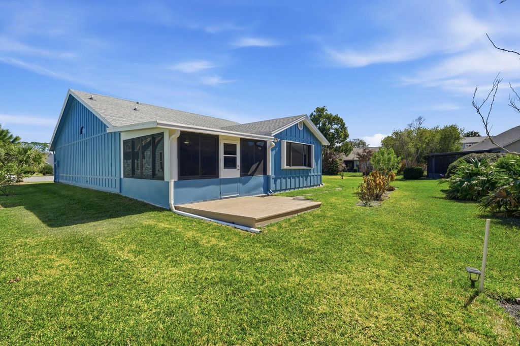 Photo of 714 Fox Tail Court, New Smyrna Beach, FL 32168 (MLS # V4947605)