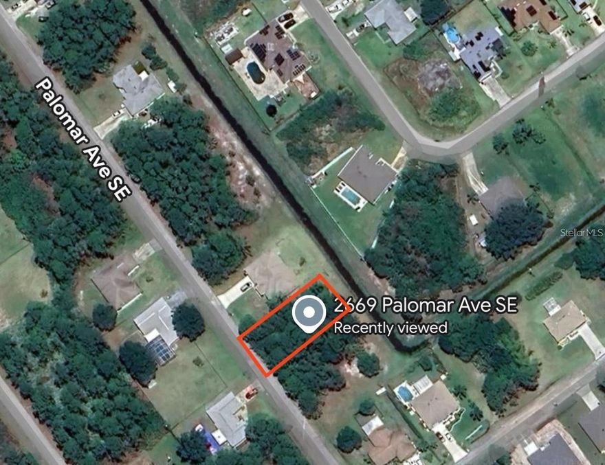 Build your dream home on this buildable lot located in the desirable Port Malabar area of Palm Bay on Waterside Rd SE. The property offers a quiet, private setting surrounded by new construction. Enjoy convenient access to the Bayside Lake Commercial Center just 10 minutes away, with Publix, gas stations, and a nearby golf course. Schools are a short drive away, and I-95 is only minutes from the property