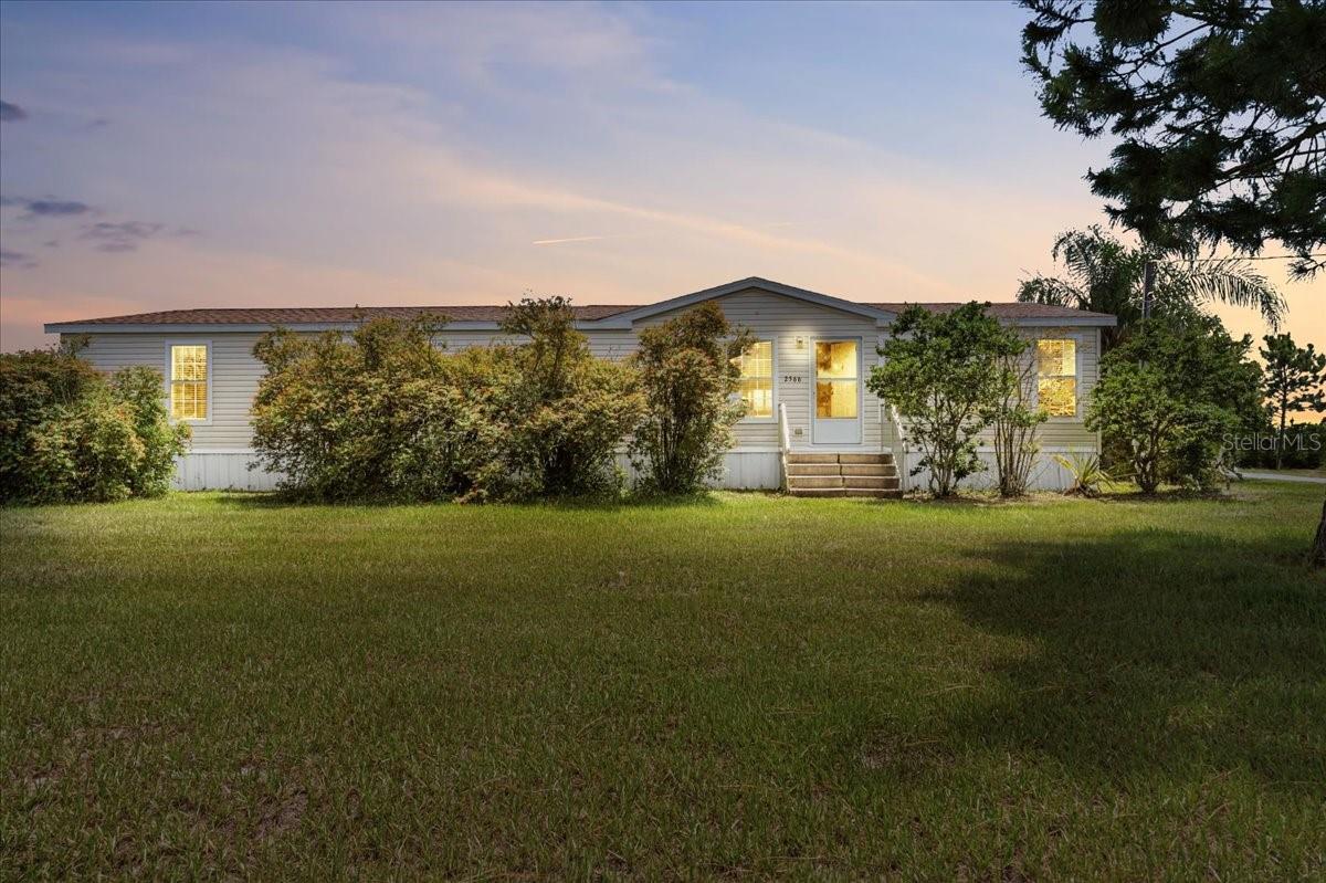 Welcome to your private retreat! This 2014-built home is perfectly nestled on 5 beautiful acres, offering both comfort and functionality. Featuring two master bedrooms for ultimate privacy, this property also includes an above-ground pool with a new pump, a screened-in porch ideal for relaxing year-round, and two storage sheds for all your tools and toys. The electric gate adds both security and convenience. Recent updates include a new AC, new roof, and the peace of mind that comes with them. Enjoy the blend of modern upgrades and country charm all in one property!