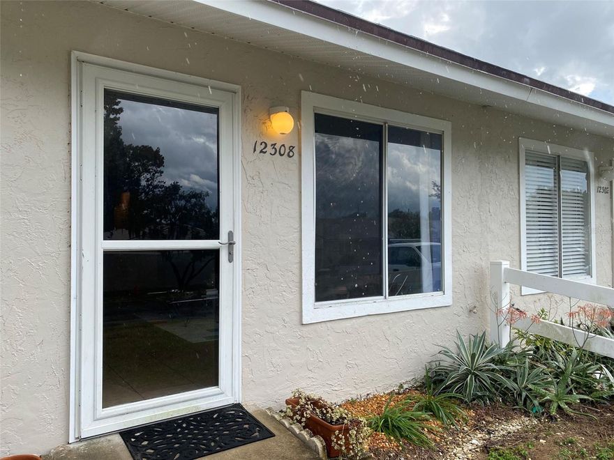 Let's work together to get you moved into to this Super cute and lovingly maintained 2/2 in TAVARES ASAP. This home has: New roof 2024, New AC 2021, New appliances 2020 and loads of updates, Plus Ceramic tile flooring through-out. The over-sized master bedroom has a huge walk in closet! There are sliding glass doors to your large covered and newly screened lanai plus there is a private en-suite with tiled shower and double sinks. Just down the hall is the second bath with shower and tub. The Kitchen has pantry/utility room with separate laundry closet  and glass door to access to lanai. Reserved owner parking. Community pool. Central location with nearby shopping, entertainment and medical. Pet friendly - Family Friendly - Call to schedule a time to see TODAY!!