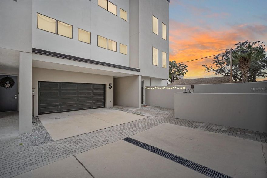 ASSUMABLE VA LOAN AVAILABLE! BRAND NEW HVAC!

This meticulously maintained townhome, Unit 6 at 1910 W North A Street, offers an exceptional opportunity for sophisticated urban living. Situated in the highly desirable North Hyde Park area, the property provides unrivaled proximity to key Tampa destinations, including Downtown Tampa and the University of Tampa (UT), ensuring effortless access to central business and cultural districts.

The residence features a modern, open-concept floor plan defined by an abundance of natural light, creating an airy and illuminated interior ambiance. Architectural highlights include elevated ceiling heights throughout the main living areas. The flooring consists entirely of tile and wood finishes, ensuring durability and aesthetic continuity while eliminating the presence of carpet.

The kitchen has been thoroughly updated, positioning it as a true culinary space. It features stainless steel appliances, premium granite countertops, and a striking, updated tile backsplash. The design incorporates a functional breakfast bar and seamlessly integrates with the dining area. High-grade granite countertops are installed throughout the interior of the unit, maintaining a consistent standard of luxury. Convenience is further enhanced by an interior washer and dryer utility area.

The upper level houses the private quarters, where the spacious bedrooms continue the theme of light and open design. All bathrooms have been elegantly upgraded with contemporary fixtures and finishes. The Primary Suite serves as a luxurious retreat, noted for its significant size. It includes a large walk-in closet featuring custom built-ins for optimal organization. A key feature of the primary suite is the elevated window exposure, providing a distinctive view of the city skyline at night. This property is ideal for residents seeking a combination of executive quality finishes, low-maintenance living, and a premier central Tampa location.