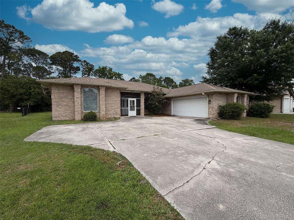 Photo of 51 Fanshawe Lane, Palm Coast, FL 32137 (MLS # V4950746)