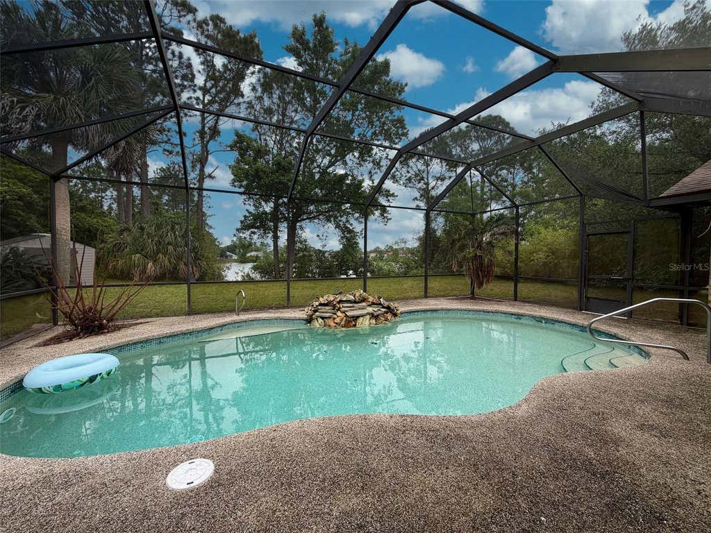 Photo of 51 Fanshawe Lane, Palm Coast, FL 32137 (MLS # V4950746)