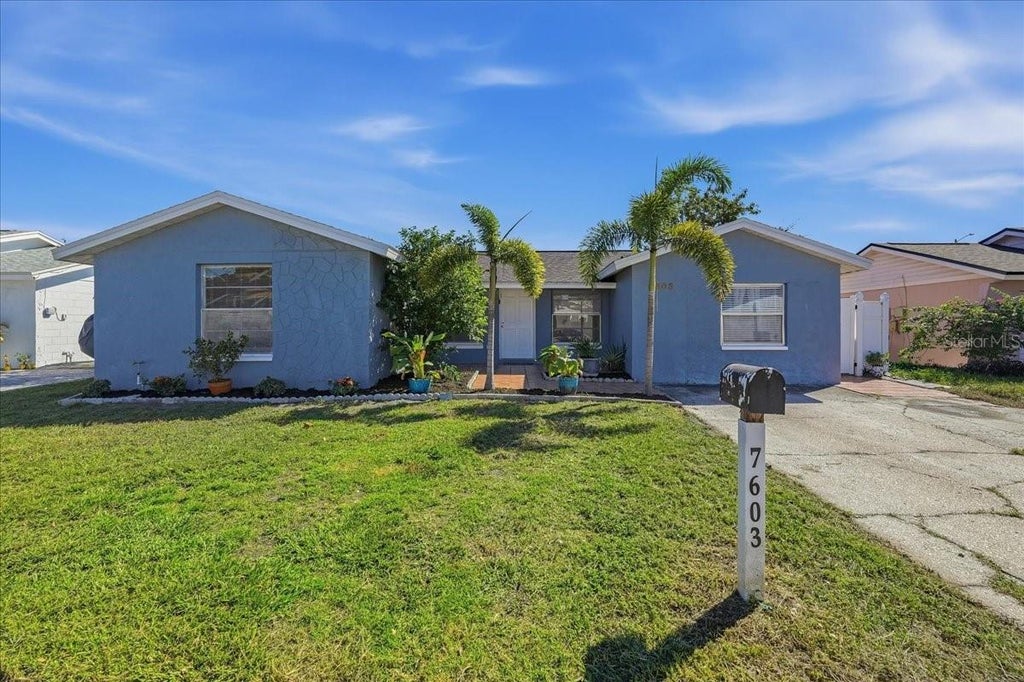 Photo of 7603 Woodland Oaks Court, Tampa, FL 33615 (MLS # TB8556468)