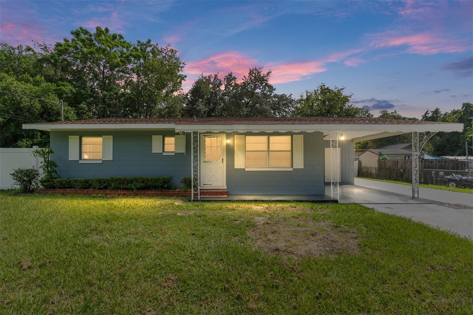 Welcome to your new home in one of northeast Ocala’s most desirable neighborhoods! This charming concrete block 3-bedroom, 1-bath residence has been beautifully renovated and is move-in ready—ideal for a first-time buyer or a savvy rental investor. The stunning new kitchen features stainless steel appliances, stylish cabinetry, fresh countertops, and a modern backsplash. Additional updates include a brand-new water heater, a newly installed electrical panel with all new breakers, and a newer AC unit for year-round comfort. The home also boasts a durable 30-year architectural roof, a freshly remodeled bathroom, new ceiling fans, and fresh interior paint. Outside, enjoy the convenience of a covered carport and a detached one-car garage with workshop area, providing ample space for projects and storage. The large, fenced-in backyard offers plenty of room for outdoor activities, pets, and entertaining. With its blend of character, quality upgrades, and generous outdoor space, this property is ready to welcome you home!