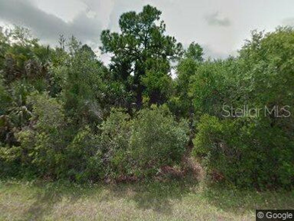 Photo of 14015 Lumidor Avenue, Port Charlotte, FL 33953 (MLS # C7463612)