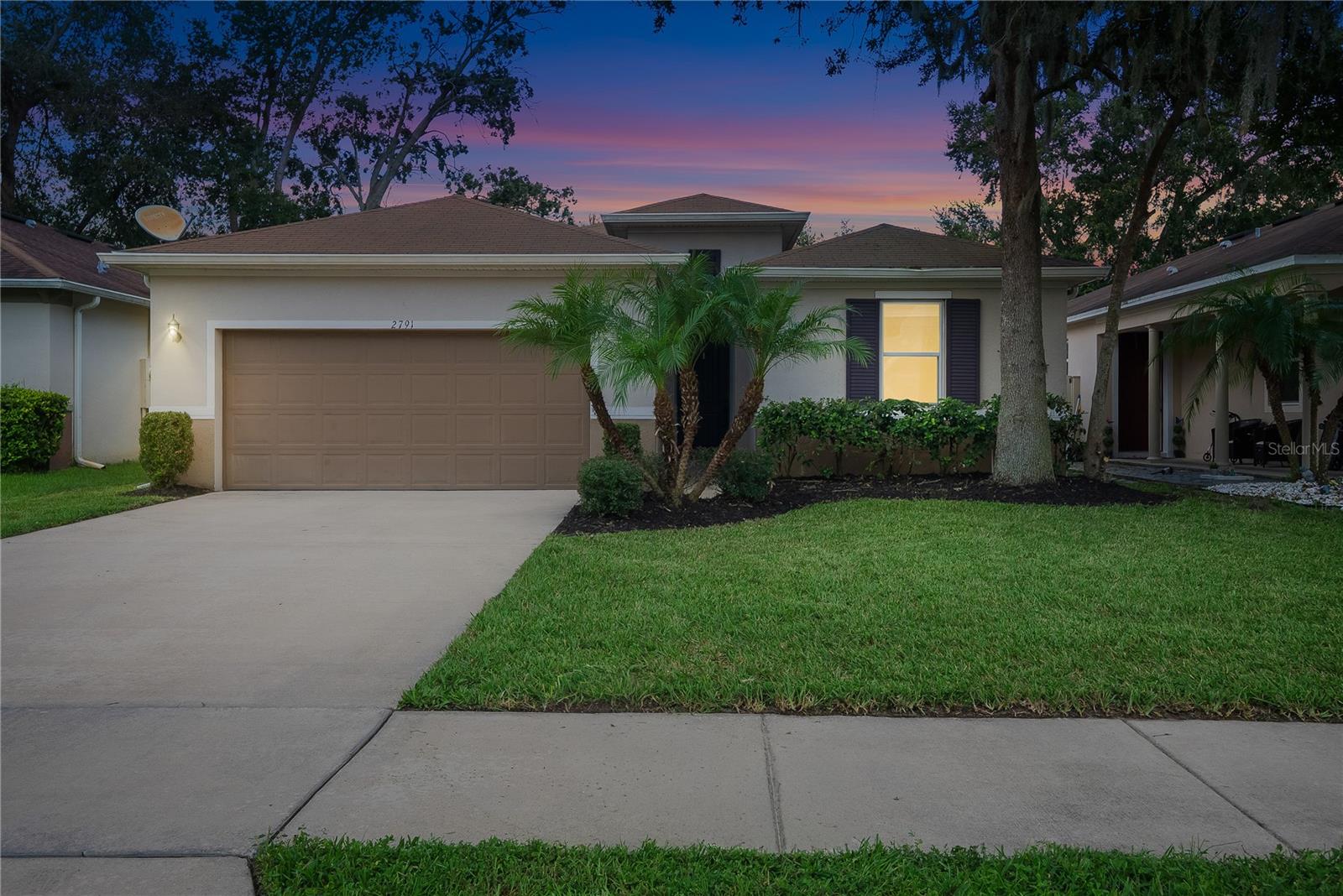 Tucked away on a peaceful cul-de-sac in the desirable Arbor Chase community, this 2016-built home blends modern design with everyday comfort. Step through the grand foyer and take in the soaring 10-foot ceilings, open layout, and natural flow that make this home feel light, bright, and welcoming. All new lighting fixtures and fresh full interior paint enhance the home’s style and move-in ready appeal. A flexible bonus room provides the perfect space for a home office, playroom, or even a fourth bedroom.
The heart of the home is the spacious kitchen, featuring 42" wood cabinetry, granite countertops, stainless steel appliances, and an extended breakfast bar where friends and family naturally gather. The kitchen flows seamlessly into the dining and living areas, creating the ideal setting for hosting game nights, dinner parties, or simply enjoying quiet evenings in.
Retreat to the oversized primary suite, where there’s room to unwind with ease, while the split floor plan ensures privacy for the additional bedrooms. Outside, a screened lanai opens to a fully fenced backyard—perfect for weekend barbecues, playtime, or even building the pool you’ve always envisioned.
Located just minutes from UCF, shopping, dining, and major highways, this home offers a lifestyle of convenience with easy access to Downtown Orlando, the airport, the attractions, and even the beaches. Here, comfort meets location—making it the perfect place to call home.
