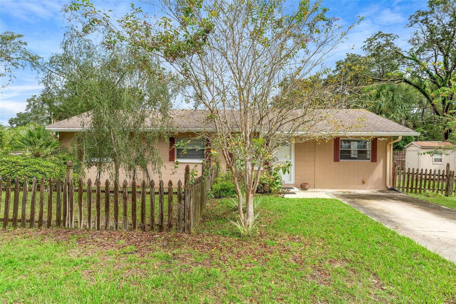 Location, comfort, opportunity—this ranch-style home has it all! Nestled in the heart of Orange City, this charming 3-bedroom, 1-bathroom home (1,152 sq ft) offers unbeatable convenience. Situated on a generous corner lot of approximately 0.25 acres with beautiful Crepe Myrtles, palms, Kumquat tree, plenty of room for your garden, complete with a shed (8X8.5) for storage. You’ll enjoy privacy, curb appeal, and plenty of room to grow. Step inside to a bright, layout featuring: Granite countertops in kitchen and newer cabinetry in both kitchen and bath, updated shower, tile flooring, a versatile bonus room perfect for an office, game, or media space and inside laundry/utility room. Screened covered porch added in 2021. Practical upgrades include a new roof installed in 2013, updated electrical panels in 2024, AC replaced in 2018, current termite bond and more. Enjoy superb access to 17-92, I-4, shopping centers, and nearby hospitals—prime for commuters, families, and investors alike. House is ready for your choice of flooring updates needed in bedrooms and bonus room. Being Sold As-is.