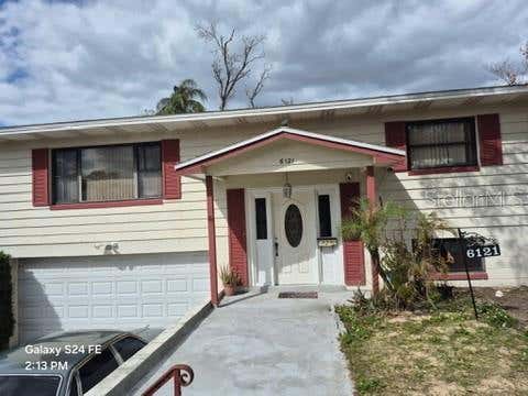 Photo of 6121 Holiday Hill Lane, Orlando, FL 32808 (MLS # O6429291)