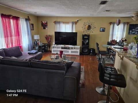 Photo of 6121 Holiday Hill Lane, Orlando, FL 32808 (MLS # O6429291)