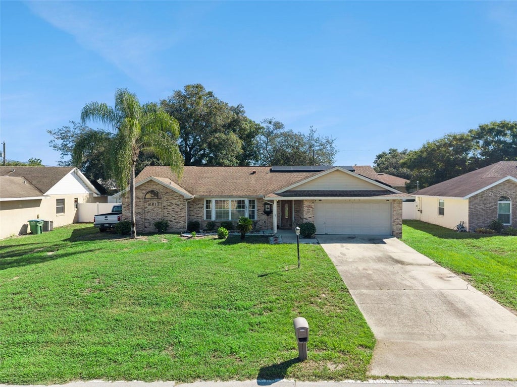 Photo of 1079 W Hancock Drive, Deltona, FL 32725 (MLS # O6440402)