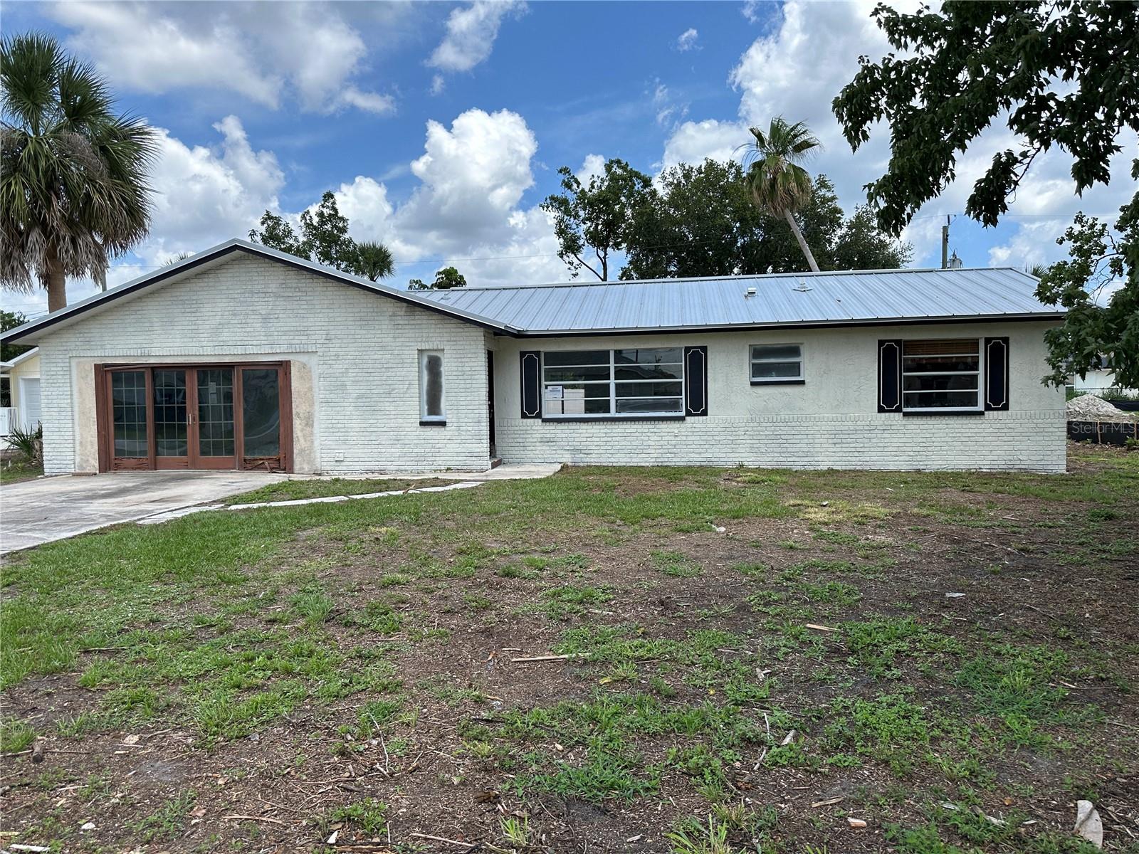 Pull up your Pinterest boards, roll up your sleeves and get ready to make all your HGTV dreams come true. This 3 bedroom 2 bath POOL home is a blank slate. Newer roof and concrete block construction give you a great start to making this a showplace. Perfect location off Fay near US1 gives you great views of rocket launches. Centrally located with an easy commute to Orlando for attractions, Port Canaveral for beach days, and the Indian River for fishing, boating and water sports.