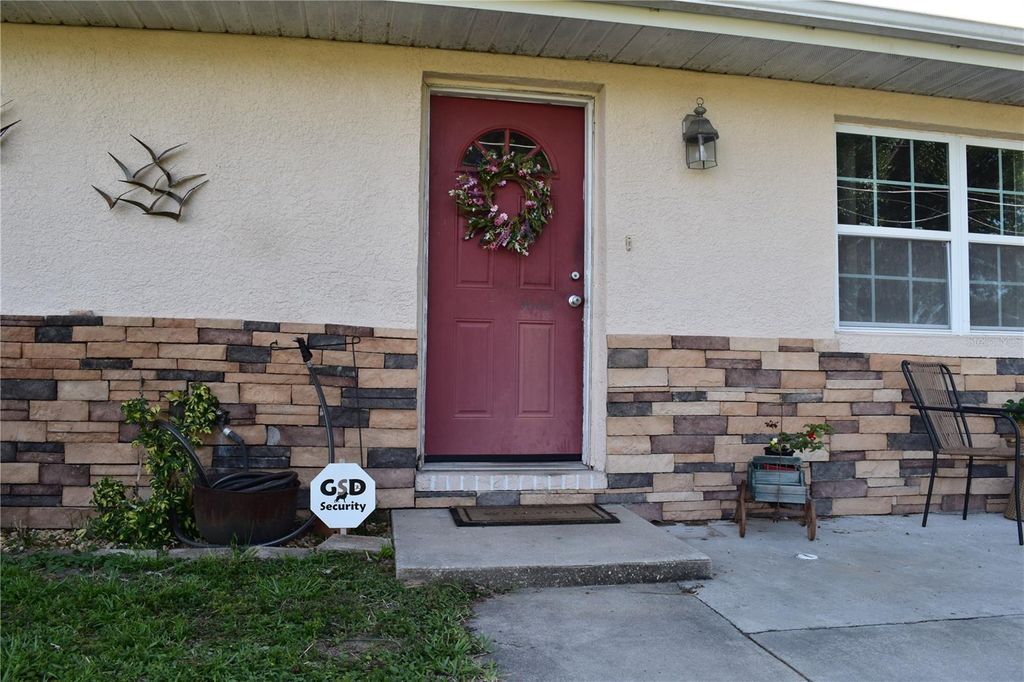 Photo of 11848 SE 70th Avenue Road, Belleview, FL 34420 (MLS # OM724341)