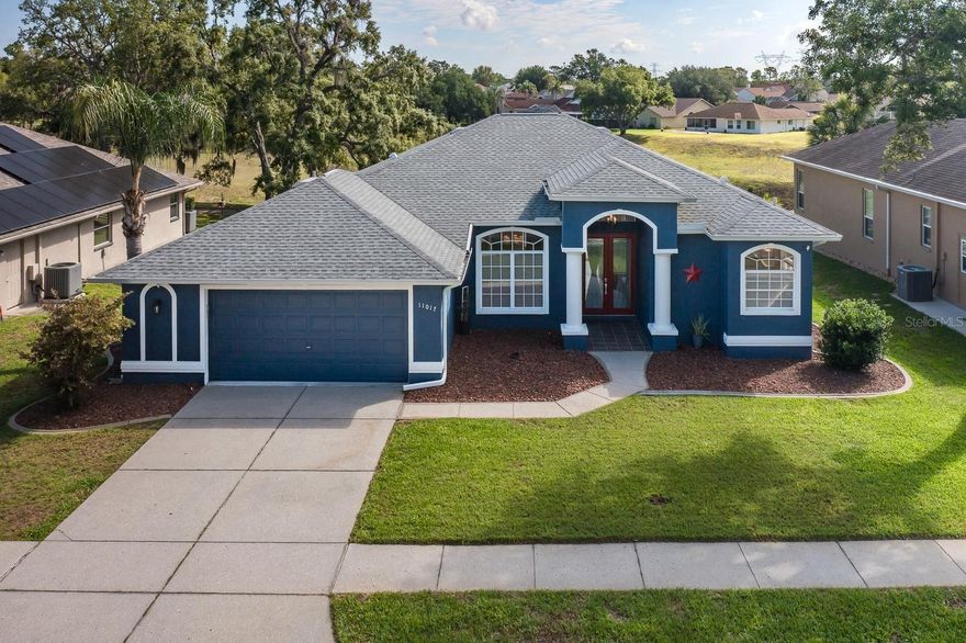 One or more photo(s) has been virtually staged. Extremely Well Maintained and Cared for Custom Built 4 Bedroom, 2 1/2 Bath and an Oversized 2 Car Garage Heated Pool Home Located in the Highly Desirable Links at Seven Hills Subdivision. Features and Upgrades Include a Newer Roof 02/06/24, A/C 04/13/20, Heated Pool 03/06/20, Paved Lanai, Pool Heater, Pool Equipment and Pool Enclosure 04/13/20. Beautifully Low Maintenance Landscaping and Great Curb Appeal Lead You to the Grand Pillard Entryway and Leaded Glass Double Door Entry. Opening to the Ever Popular Open Kitchen to Dining to Living Room Styled Floorplan. Please Take Notice All of the Unique Architectural Features Offered Such as High Vaulted Ceilings, Chair Rails, Crown Moldings, Trayed Living Room Crown Molded Ceiling, Family Room Custom Built Accented Ceilings and Custom Built Ins. Beautiful Tiled and Wood Laminate Flooring and Designer Two Tone Interior Paint. Larger Open Kitchen Features Lots of Kitchen Cabinetry Storage, Ample Counter Top Workspace and a Top of the Line Stainless Steel Appliance  Package. Larger Primary and En-Suite Boasts Beautiful Wood Laminate Flooring, Huge Walk-In Closet, Garden Soaking Tub, Glassed Doored Walk-In Tiled Shower and Large Double Vanity Sinks and Cabinetry Storage. Split Bedroom Floorplan Features Larger 2nd, 3rd and 4th Bedroom that Feature Built-In Closets, CeilingFans and All Offer Easy Access to the Full Sized 2nd Bath. Living Room, Primary Suite, 4th Bedroom and Triple Sliding Glass Doors in the Family Room Each Offering Easy Access to the Beautifully Designed and Spacious Paved lanai and Heated Pool Area. Perfect for Family BBQ's Gatherings and Entertaining Family and Friends. Best School District in All of Hernando County and Access to Spring Hill's Top-Rated Charter and Magnet Schools. Close to Shopping, Banking, Restaurants, Newly Acquired Tampa General Hospital and Medical Center and an Easy Walk to the Renovated YMCA. Which Offers a Heated Olympic Sized Pool, Full Gym and Lots of Adult and Family Programs. HOA Only $255.00 a Year! And NO CDD's! Can't Built This Home in This Neighborhood at This Price! A Truly Must See Home!