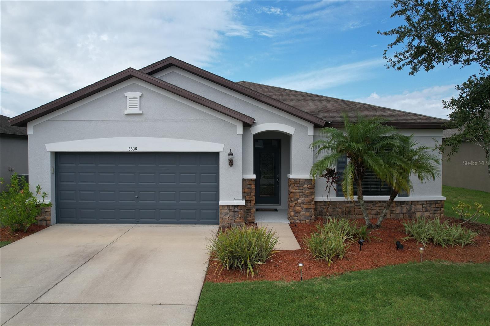 This beautifully maintained home offers 3 bedrooms, 2 bathrooms, plus a versatile den/office, all thoughtfully designed across 2,144 sq. ft. of living space. The open floor plan with soaring ceilings creates an inviting atmosphere, perfect for both everyday living and entertaining. The kitchen is a true centerpiece, featuring stainless steel appliances, granite countertops, a spacious island with seating, and plenty of storage. The private primary suite is a retreat of its own with a large walk-in closet and a spa-like ensuite bathroom. Additional highlights include a two-car garage, dedicated laundry room, and flexible living areas to fit your lifestyle. Harrison Ranch has much to offer. Enjoy resort-style amenities such as a 24-hour fitness center, clubhouse with game room, junior Olympic-sized pool, two playgrounds, pickleball, basketball and tennis courts, plus five miles of scenic walking trails. Don’t miss the opportunity to make this exceptional Parrish home yours. Schedule your showing today!