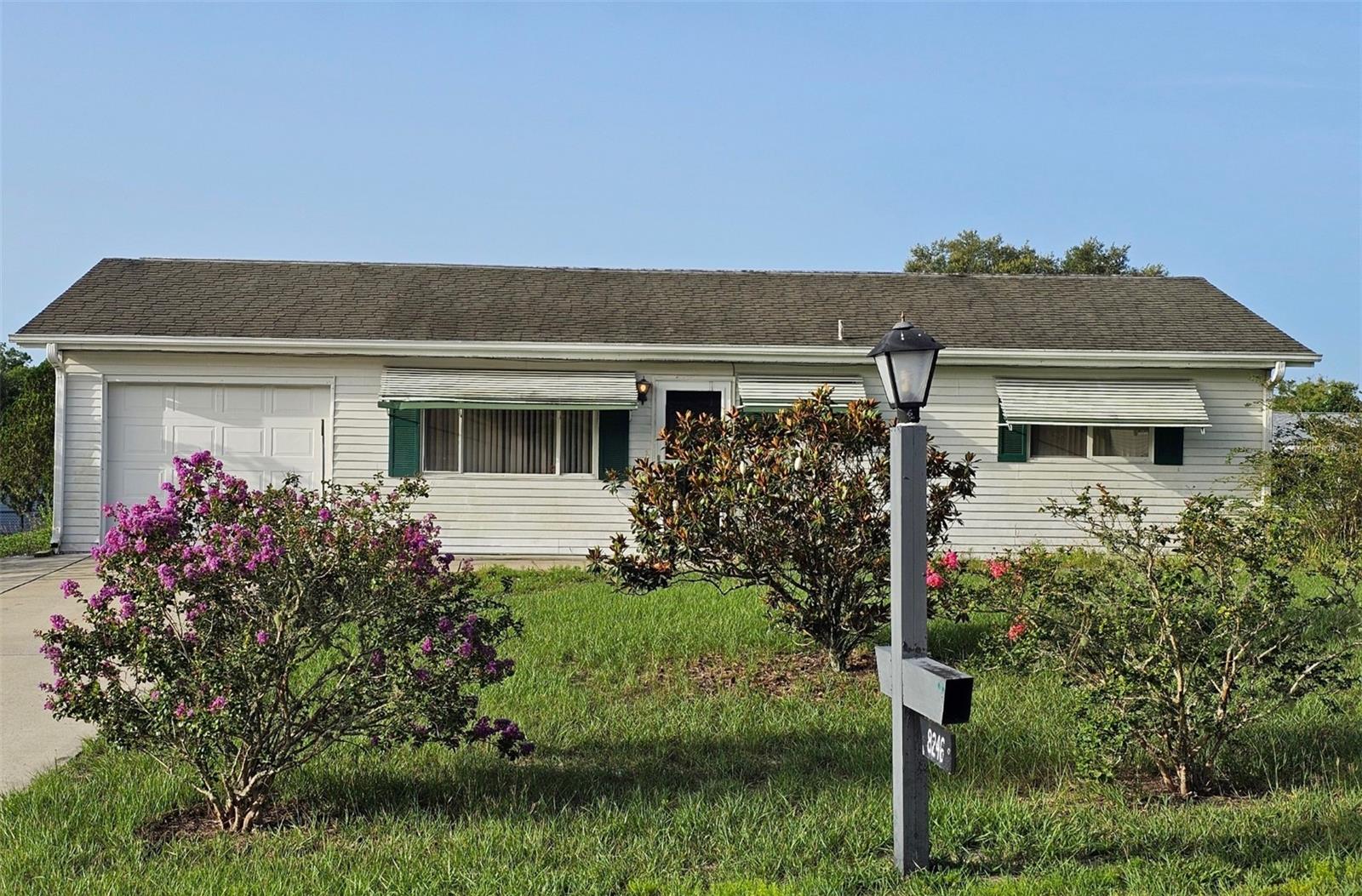 Welcome to this charming 2-bedroom, 2-bath single-family home offering approximately 1,413 sq ft of comfortable Florida living on a generous 10,018 sq ft lot. Built in 1988 and thoughtfully updated in 2007, this well-maintained property features a heat pump HVAC system, a mix of carpet and tile flooring, and a functional layout with a spacious kitchen and inviting living area.
Perfect for first-time buyers, downsizers, or investors, this home sits in a quiet, established neighborhood and is truly rental-ready. The attached garage provides secure parking and additional storage, while the expansive lot offers plenty of potential for outdoor improvements or future expansion.