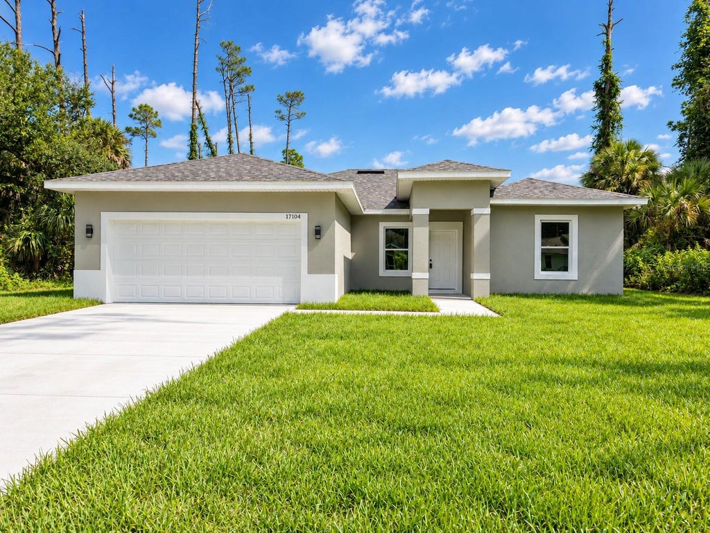 Photo of 17104 Doyle Ave, Port Charlotte, FL 33954 (MLS # O6441154)