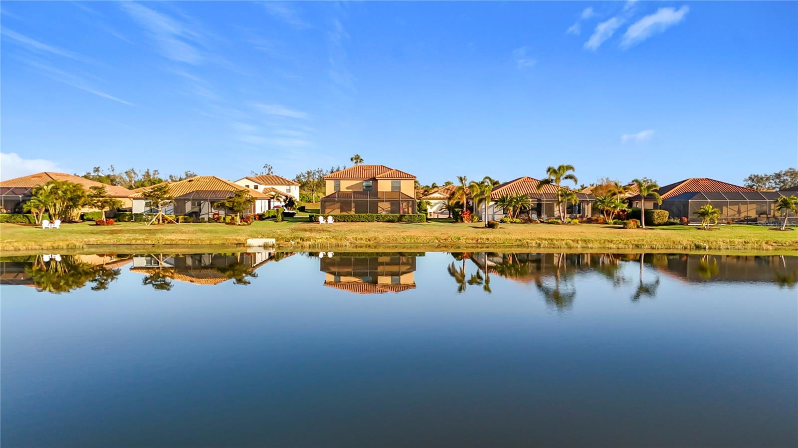 HIGHLY MOTIVATED SELLERS!! BRING ALL OFFERS! Live the Resort Lifestyle Every Day in River Strand Golf and Country Club!
Welcome to the exclusive, gated community, where luxury living meets unparalleled amenities in one of Bradenton’s most sought-after neighborhoods. This stunning waterfront home offers more than just four bedrooms, three full bathrooms, and two rare half baths—it’s your gateway to a vibrant, active lifestyle filled with premium amenities and everyday comfort.
Step into 2,884 square feet of beautifully designed living space, where soaring ceilings, elegant crown molding, and solid surface countertops create an upscale atmosphere perfect for entertaining or relaxing. The thoughtfully designed floor plan includes a spacious primary suite on the main level with a spa-like bathroom and walk-in closet, while upstairs offers three additional bedrooms, a Jack-and-Jill bath, and a versatile bonus room ideal for a home office, media room, or play space. Every bedroom in the home features a walk-in closet and there are TWO walk-in closets in the Primary Bedroom.
This home also features a private heated pool and spa with a screened lanai and covered patio, ideal for enjoying Florida’s year-round sunshine and outdoor living. The chef’s kitchen is complete with granite countertops, a walk-in pantry, modern appliances, and plenty of space for gathering. You'll also appreciate the extra storage throughout the home, including a large closet under the stairs and an additional kitchen closet perfect for storing countertop appliances.
But what truly sets this home apart is the lifestyle that comes with it. Living in River Strand means you’ll enjoy access to a 27-hole championship golf course, two state-of-the-art fitness centers, Har-Tru tennis courts, and vibrant pickleball facilities. The resort-style pools, complete with a lazy river, offer the perfect way to unwind. Social life thrives here, with a full calendar of community events including group fitness classes, live entertainment, biking groups, and more. The clubhouse features both casual and upscale dining options, plus a poolside Tiki Bar for relaxed evenings with friends and neighbors. Additional community perks include a library, walking paths, and on-site golf and tennis pro shops.
The home itself also includes hurricane shutters, an irrigation system, and a spacious two-car garage. Designed in classic Mediterranean style with tile roofing and charming curb appeal, it offers a rare combination of elegance, function, and fun. Your HOA includes landscaping, internet and cable, 24/7 security, 24/7 gym access, and much more!
With its private pool, beautiful finishes, and full access to world-class amenities, this home is your opportunity to enjoy resort-style living every day in one of the area’s most desirable communities.