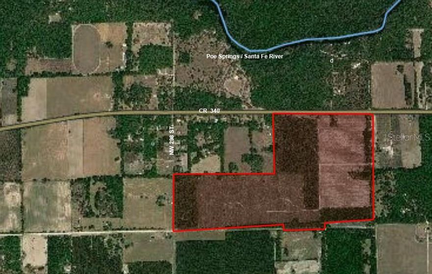 Here is a unique timberland / recreation / investment opportunity located across the street from the Santa Fe River and minutes from High Springs, FL in the heart of north Florida's world-class springs. Property has total of 250 +/- gross acres that includes approximately 220 acres of planted pine and approximately 30 acres of mature hardwoods.  Adjacent to Poe Springs County Park and close to Gilchrist Blue Springs State Park, this is an ideal recreational location for a variety of pursuits, including investment and development. The property features significant paved road frontage on three sides (State Highway 236 (CR 340), NW 298th ST, and NW 174 Ave). The property borders the Alachua-Gilchrist County line and currently enjoys Agricultural Classification with the majority in planted slash pine with charming, majestic oaks throughout.
