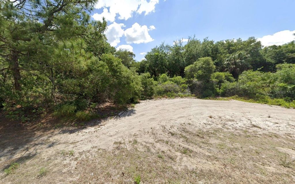 Photo of 3176 Cabaret Street, Port Charlotte, FL 33948 (MLS # W7879777)
