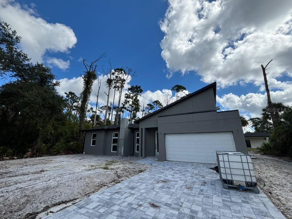 Photo of 72 Hoffer Street, Port Charlotte, FL 33953 (MLS # O6449860)