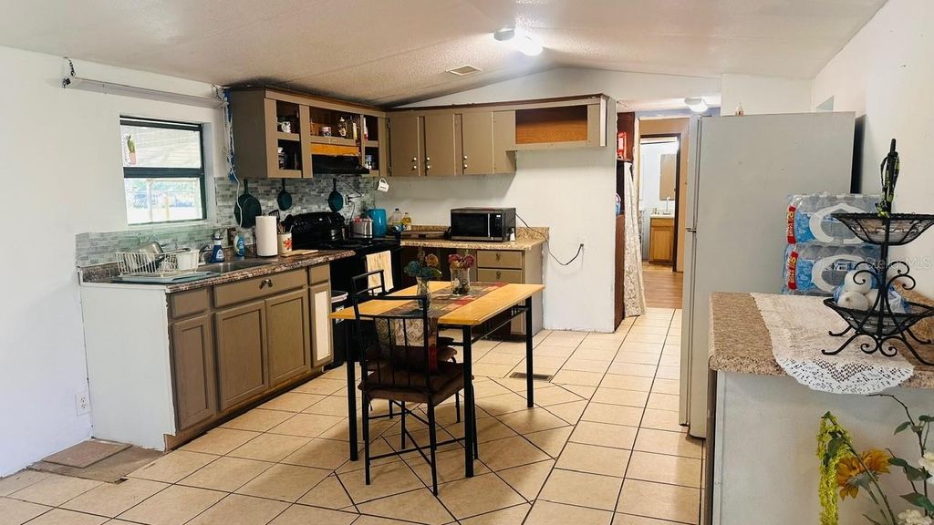 Photo of 816 Diamond Acres Road, Davenport, FL 33837 (MLS # L4961010)