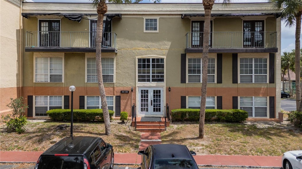 Photo of 4051 Dijon Drive #4051J, Orlando, FL 32808 (MLS # O6442668)