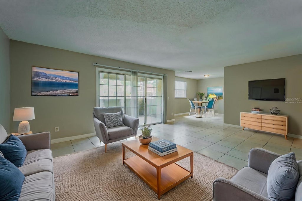 Photo of 4051 Dijon Drive #4051J, Orlando, FL 32808 (MLS # O6442668)