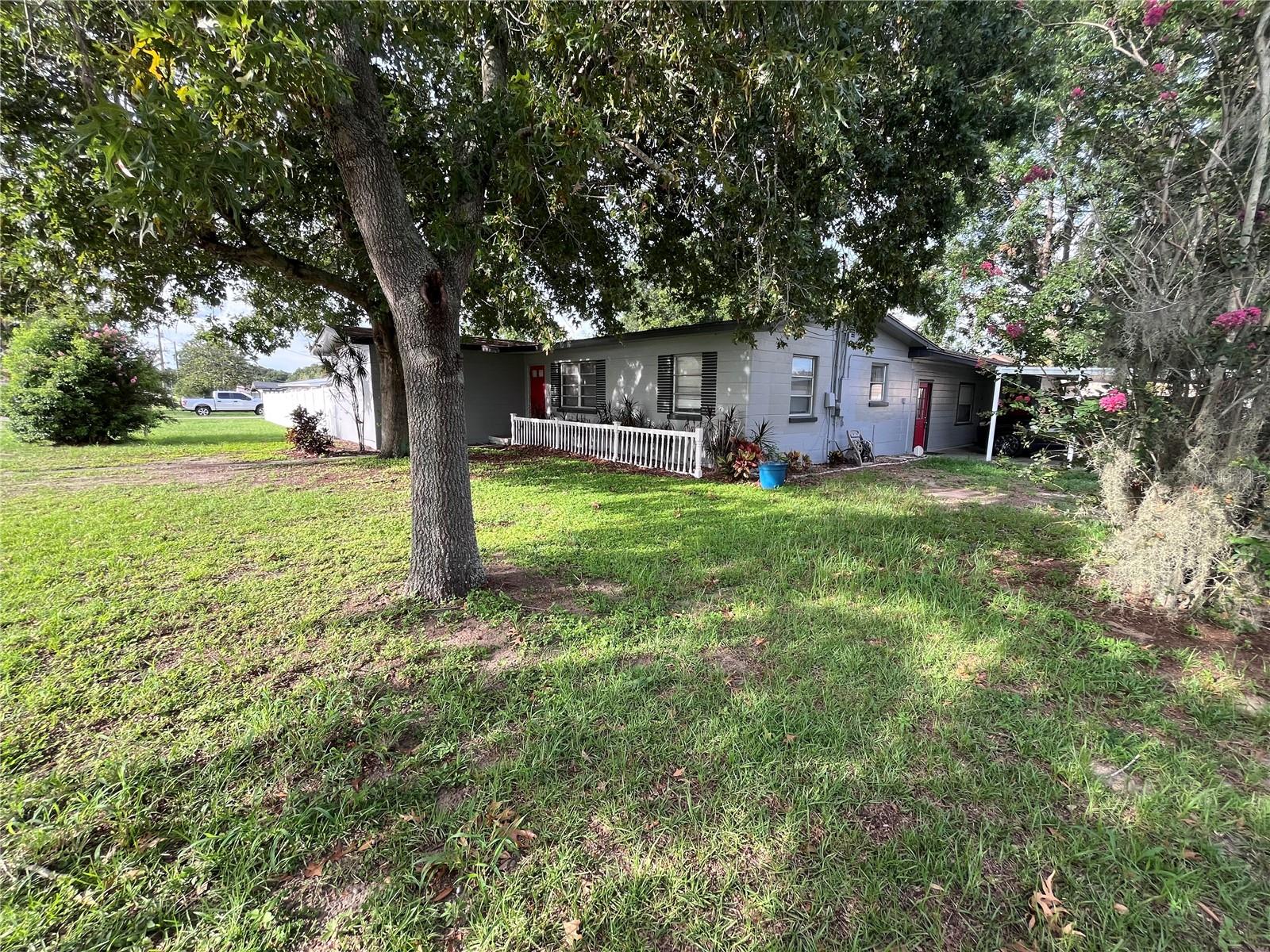 Tucked away just seconds from Lake Hartridge Nature Park and boat ramp, this charming 3-bedroom, 2-bath home offers the perfect blend of comfort, outdoor fun, and unbeatable location. With access to Winter Haven’s Chain of Lakes right around the corner, this property is a dream for nature lovers and boating enthusiasts alike.
Inside, you'll find a warm and inviting layout that includes a spacious living room, a separate family room ideal for entertaining, and a functional kitchen equipped with appliances. A rare and expansive half-acre lot, this solid masonry home blends timeless character with modern comforts, offering 1,606 square feet of living space. Step outside and enjoy your own private Florida retreat—a fully fenced backyard with an in-ground pool, a brand-new pool pump (2025), new drain field (May 2025) and a spacious deck ideal for relaxing or entertaining.
The home features a spacious additional family room that offers endless possibilities. Whether you need a forth bedroom, a cozy guest suite, a home office, playroom, or simply extra storage space, this flexible area can easily adapt to your needs. With its own entrance and generous square footage, it’s a perfect extension of the home—ready to serve whatever purpose fits your lifestyle.
This oversized lot also offers exceptional storage and functionality, with multiple sheds that stay with the property providing ample room for tools, equipment, or hobbies. A wide rolling gate opens to allow easy access for boat parking, making it perfect for those who want to take full advantage of nearby Lake Hartridge—just a short walk away. Lake Hartridge Nature Park and boat ramp, offering easy access to Winter Haven’s scenic Chain of Lakes.
With no HOA restrictions, you’ll enjoy the freedom to truly make this property your own. Whether you're looking for a full-time residence, a seasonal getaway, or a solid investment, 2200 21st Street NW delivers timeless appeal with just enough room for your personal decorative flair to shine.
