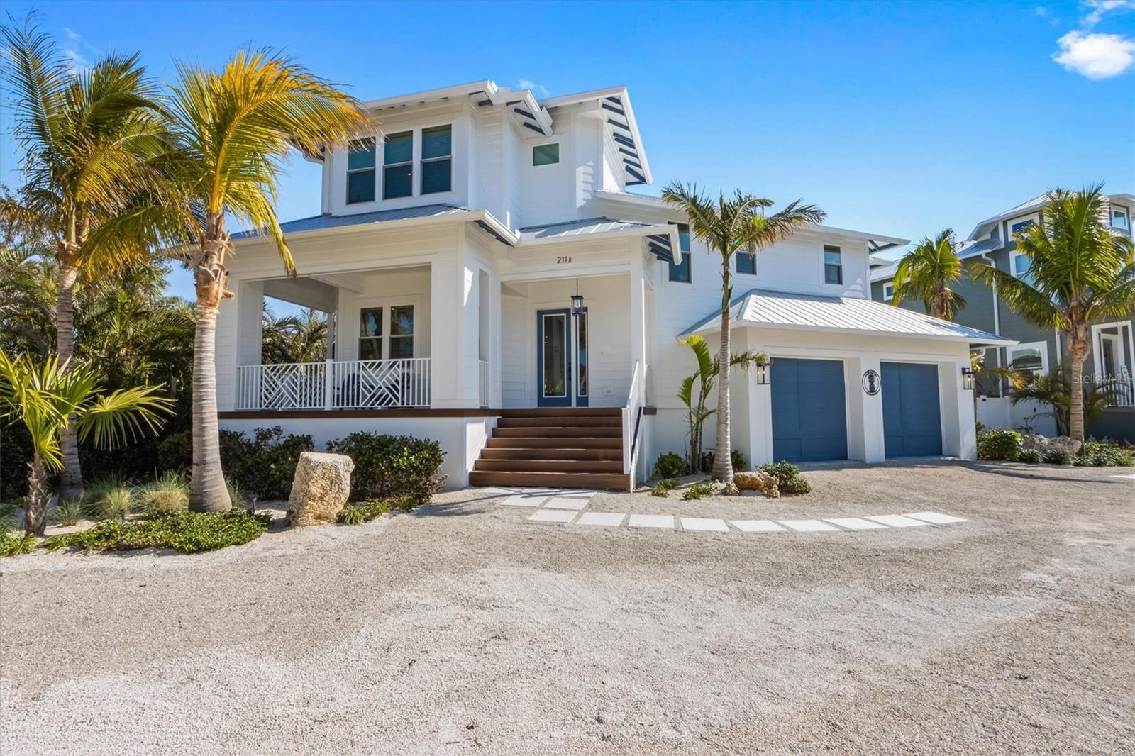 Coastal Chic design, this luxury home features 4 bedrooms and 5 bathrooms with a private heated pool located on Anna Maria Island! As you walk in the first living level you will find an open concept kitchen and living room, with a formal dining just off to the side. The living room has a full wall of impact slider doors that lead out to the patio balcony for outdoor dining and steps that lead to the lush turfedlandscaped backyard oasis with heated pool and outdoor shower. The upscale kitchen includes solid wood cabinets, open shelving, quartz countertops, wine fridge, induction stove top, plenty of pantry and storage and a huge island perfect for entertaining. All the bedrooms are very spacious for utmost comfort and all have ensuite bathrooms for your privacy. They each have their own beachy color scheme and decor. The primary bedroom is very spacious, the bathroom has dual sinks, soaking tub and a large walk-in shower and walk- in closet. There is also a seating area right off the primary for an office or additional seating area. The 5th bathroom is just off the main living space and right by the back slider door for easy pool bath access. Full laundry room with a sink and storage. Plenty of parking in shell driveway in addition to the large epoxied 2 car garage. Enjoy being so close to the beach to walk down for sunsets every night.