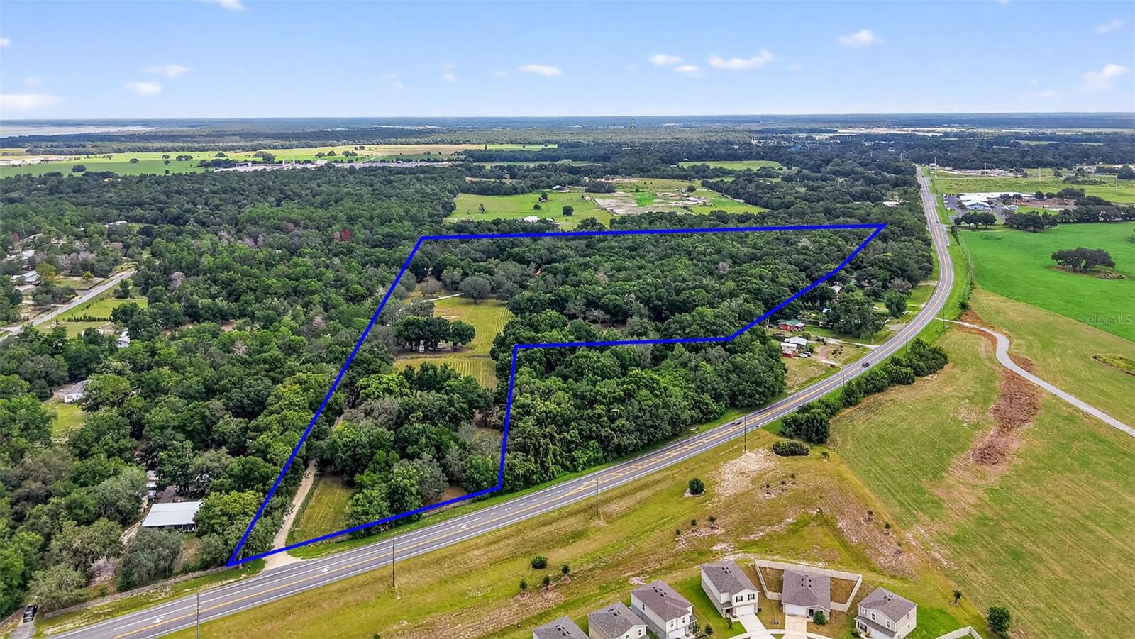 NEWLY ANNEXED 30 +/- Acres ZONED COMMERCIAL currently been annexed into the City of Bushnell! Water and Utilities are now available. This property now offers many uses with the current rezoning to include Permitted Uses: Offices, Laundromat and dry-cleaning retail stores, convenience stores with or without fuel service, adult congregate living facilities/skilled nursing, retail sales and services/outdoor display, office complex, medical office/clinics. parking garages, banks, bars and lounges associated with restaurant use, hotels/motels, shopping center/malls, rental storage facilities, RV Parks and among many other uses. Situated on Hwy 301 with Bushnell city limits now, makes access and visibility even more desirable for this property which is located across the street from the Langley Medical Complex and Lake-Sumter State College Campus Facility! You are also within a few miles from Middleton, a community within The Villages, the largest and top residential selling communities in the country. This property is strategically positioned and sits between I-75 and the Florida Turnpike, offering exceptional accessibility and visibility for businesses seeking a high-traffic location. With utilities to the site, this property is primed for immediate development with Heavy Commercial Land Use.