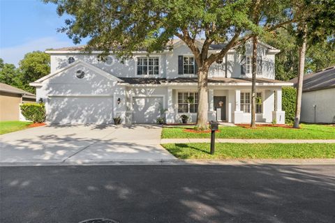 Photo of 7180 Winding Lake Circle, Oviedo, FL 32765 (MLS # O6404747)