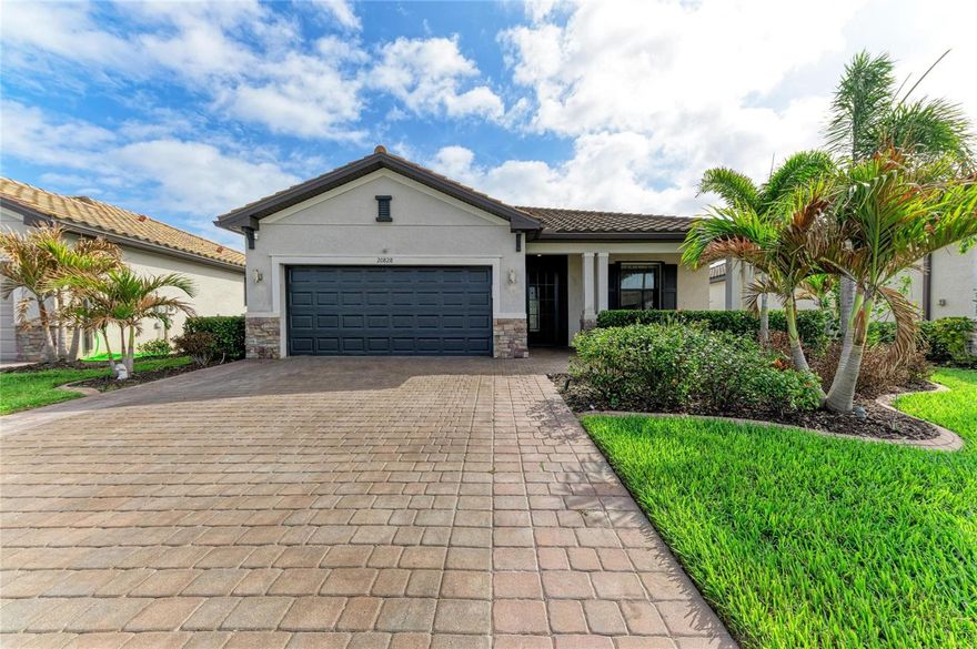 Motivated Seller Alert!! This POOL/SPA home features outdoor PRIVACY GALORE with 3 bedrooms, 3 bathrooms, and a 2-car garage. Every window has ACCORDION HURRICANE SHUTTERS, and there is an electric KEVLAR HURRICANE SCREEN. LAWN MOWING IS INCLUDED in the LOW HOA fees. There is NO CDD fee, and the home is in a convenient, desirable part of town. There are 3 FULL BATHROOMS dedicated to each bedroom in this SPLIT FLOOR PLAN. The OPEN CONCEPT living area boasts an ELECTRIC FIREPLACE, a FEATURE WALL, and porcelain tile floors. The kitchen has modern finishes, GRANITE COUNTER TOPS, stainless steel appliances, a new stove and dishwasher, and a WALK-IN PANTRY. The master bath is complete with a SOAKING TUB, a separate shower, and DUAL SINKS. The home is equipped with a PE SOLAR PANEL system with Enphase IQ7 microinverters, contributing to REDUCED MONTHLY ELECTRIC COSTS. There is a WHOLE-HOUSE water system by Express Water, including a REVERSE OSMOSIS softener, that delivers clear, mineral-balanced water. The MATURE LANDSCAPING surrounds the upgraded paver sidewalk. A screened-in entryway enclosure provides a nice cross breeze throughout the home. Conveniently located within 15 minutes of 11 county beaches. Minutes from Downtown Venice, shopping, dining, golf, and the Wellen Park Town Center, and the Atlanta Braves Spring Training facility, this home is perfect for full-time living or a seasonal retreat.