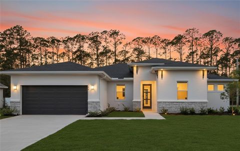 Photo of 36 Egan Drive, Palm Coast, FL 32164 (MLS # FC315628)