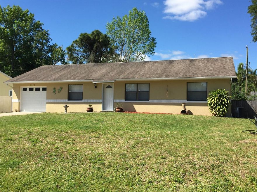 DON'T MISS THIS GEM! PLENTY OF ENTERTAINMENT SPACE WITH THIS LOVELY AND WELL MAINTAINED 3 BEDROOM AND 2 BATHROOM AND GARAGE IS JUST WHAT YOU ARE LOOKING FOR! NEWLY PAINTED CONCRETE BLOCK HOME HAS GREAT MODERN UPDATES. TUCKED AWAY ON A QUIET STREET AT THE SOUTH END OF THE FLORIDA SHORES COMMUNITY, CLOSE TO SCHOOLS AND OUR NEWLY REMODELED PARK COMPLETE WITH SKATE PARK, DOG ENCLOSURE AND WATER FEATURE FOR THE KIDS TO COOL OFF. THE HOME'S FEATURES INCLUDE A HUGE SCREENED PORCH, 3 PIECE APPLIANCE PACKAGE WITH BRAND NEW STAINLESS STEEL REFRIGERATOR. IN CABINET TRASH/RECYCLE RECEPTACLES. NEW CLOSET DOORS THROUGHOUT. BEAUTIFUL TILE WITH DECORATIVE DETAILS IN LIVING AREAS AND REAL WOOD FLOORS THROUGHOUT BEDROOMS. MASTER SUITE HAS A SPACIOUS WALK-IN CLOSET WITH BAMBOO FLOORING AND MASTER BATHROOM HAS BUILT IN LINEN CLOSET WITH EXTRA CLOTHES HANGING SPACE. LAUNDRY ROOM WITH CLOSET/STORAGE JUST OFF THE UPDATED GALLEY KITCHEN. THE GRAND BACK PATIO IS ALMOST THE LENGTH OF THE THE WHOLE HOUSE! THIS LARGE BACK YARD WITH PLENTY OF ROOM FOR A POOL IS PARTIALLY FENCED BY NEIGHBORS FENCING. EXTERIOR PAINT DONE 2 YEARS AGO AND REFRESHED IN JANUARY 2020. NEW INTERIOR PAINT DONE IN FEBRUARY 2020. NEWER ROOF, APPROXIMATELY 12-14 YEARS. NEWER A/C, 7-8 YEARS. NEW WINDOW TREATMENTS THROUGHOUT. REMOTE CONTROL MODERN FANS. *All facts thought to be reliable but are not guaranteed to be accurate; you are advised to verify facts that are important to you. ;3rd Party Gr Com Reqd ;Water: City