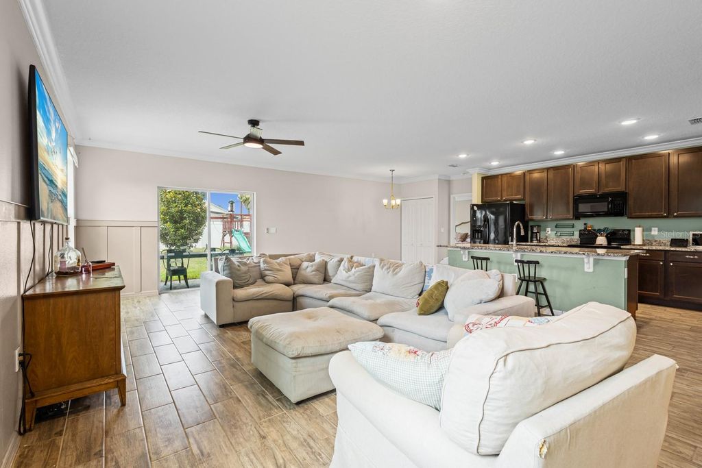 Photo of 338 Pinecrest Loop, Davenport, FL 33837 (MLS # O6391914)