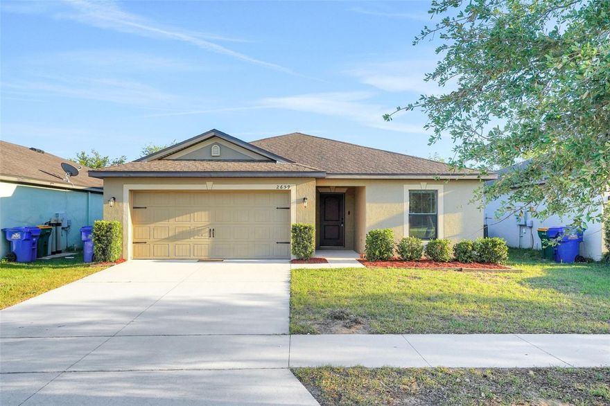 Don't miss this move-in ready 3 bed, 2 bath home in the heart of Tavares! Built in 2017, this home offers like-new construction with new quartz countertops, luxury vinyl flooring, and fresh paint throughout.  The kitchen features an island countertop perfect for cooking, entertaining, and eat-in dining.  The washer and dryer have their own laundry room and convey with the sale of the home. With a bright, functional layout, updated finishes, and low maintenance living, this home is perfect for first time buyers or investors alike! Schedule your showing today!