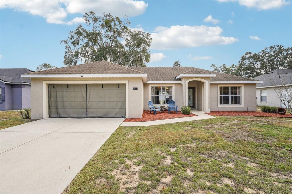 Photo of 10118 Rockdale Drive, Leesburg, FL 34788 (MLS # O6373508)