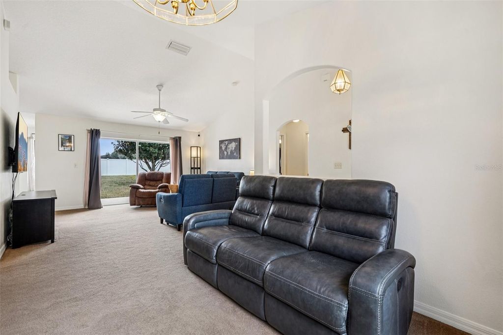 Photo of 10118 Rockdale Drive, Leesburg, FL 34788 (MLS # O6373508)