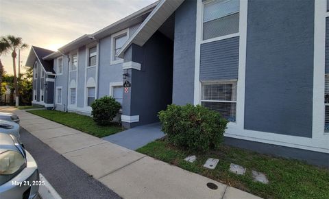 Photo of 4136 Pershing Pointe Place #5, Orlando, FL 32822 (MLS # O6349948)