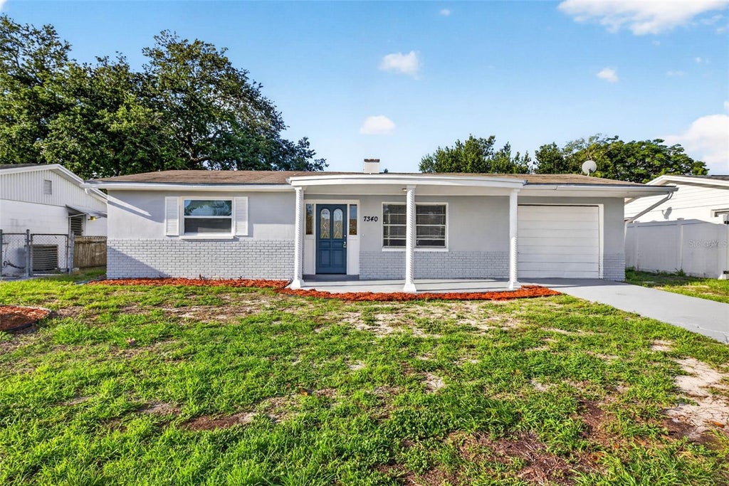 Photo of 7340 Ivanhoe Drive, Port Richey, FL 34668 (MLS # TB8546826)