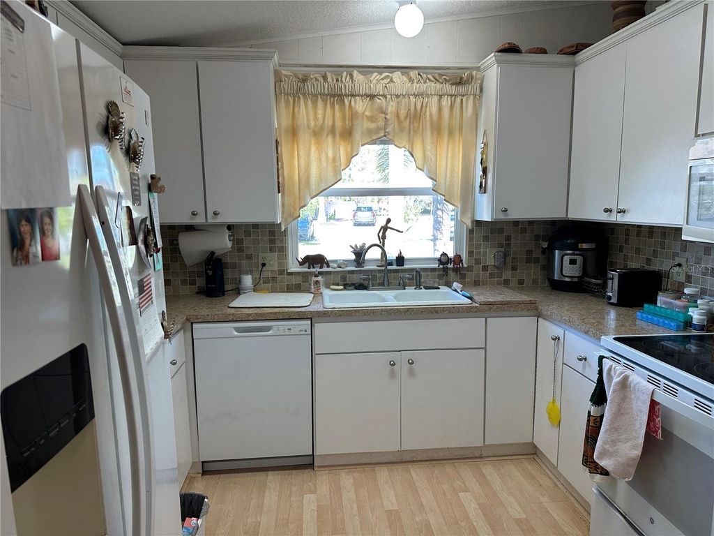 Photo of 282 Harbor Isles Drive, North Port, FL 34287 (MLS # N6142276)