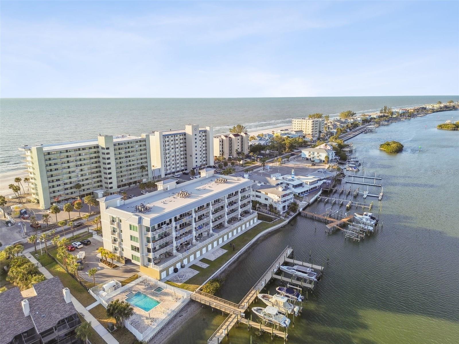 No storm damage or catch up reserve assessments. BEING SOLD FULLY FURNISHED! Welcome to this exceptional penthouse located in beautiful Indian Shores, offering over 220 feet of direct views of the intracoastal waterway and only STEPS AWAY AWAY FROM THE BEACH. This 3-bedroom, 3.5-bathroom home spans an impressive 3,250 square feet, perfectly capturing the luxurious coastal lifestyle.
As you enter, you’ll be greeted by an oversized living room with soaring high ceilings and abundant natural light, creating a bright and inviting atmosphere. The open floor plan flows seamlessly from the living area to the dining and kitchen spaces, making it ideal for both entertaining and everyday living.
The kitchen is a chef’s dream, featuring top-of-the-line Wolf appliances, including an induction range and microwave drawer, as well as a three-piece built-in Subzero system with refrigerator, wine storage, and freezer. A hidden pantry doubles as a messy kitchen, offering ample storage for small appliances and serving trays, keeping the main kitchen pristine.
Custom-designed lighting enhances every room, creating a warm and sophisticated ambiance. The home also includes custom-built storage in every closet, including cabana storage on the first floor, combining functionality with style.
Enjoy breathtaking water views from every angle. Windows throughout the home are fitted with custom blinds, electric shades, draperies, or plantation shutters, providing a perfect blend of privacy and style.
For outdoor enthusiasts, this property offers direct public beach access with a convenient crosswalk, as well as direct access to a nearby public dog park, perfect for pet lovers. Indian Rocks Beach is just minutes away, featuring a variety of dining options, including local favorites like Salt Rock Grill.
Conveniently located near St. Pete–Clearwater International Airport, this home ensures effortless connectivity to all your destinations.
This penthouse truly represents the best of Florida living. Contact us today to schedule a private tour and make this stunning property your new coastal retreat! No proposed assessments as this community is well funded!