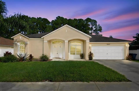 Photo of 20827 Woodvale Lane, Land O Lakes, FL 34638 (MLS # TB8560275)